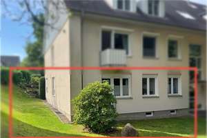 Einzigartige 4-Zimmer-Wohnung mit Garten, Terrasse, Garage und Keller