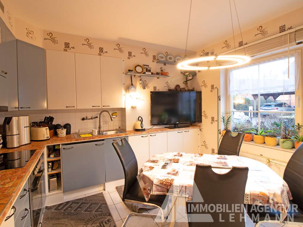 Immobilie in Rüdnitz - Solides Reihenhaus mit Terrasse, Garten und Fernwärme - Bild 1