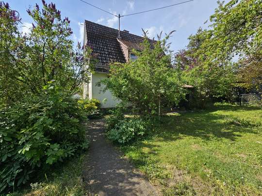 Gemütliches Einfamilienhaus in sonniger Lage mit großer Terrasse, XL-Garage und schönem Fernblick