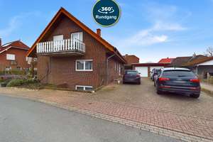 TOP-INVESTMENT: FAMILIENFREUNDLICHES MFH IN SACKGASSENLAGE MIT GARTEN, TERRASSE, BALKONEN & GARAGEN! – Die vollständige Adresse der Immobilie erhältst du vom Anbieter., 49434 Neuenkirchen-Vörden – Vorschaubild 1