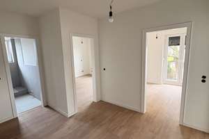 Erdgeschosswohnung mit Rheinblick in Köln-Sürth