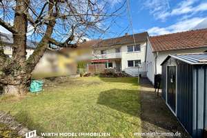 Zweifamilienhaus  mit Garage, Nebengebäude und Stellplätzen in Ettleben – Die vollständige Adresse der Immobilie erhältst du vom Anbieter., 97440 Werneck – Vorschaubild 1