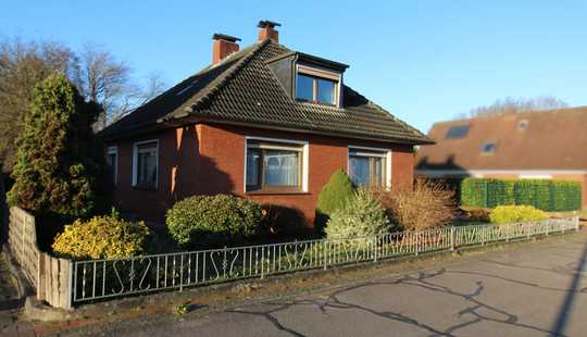 Bild von Idyllisches Wohnen direkt am Dorfteich mit zwei Garagen in zentrumsnaher Wohnlage von Ihrhove!