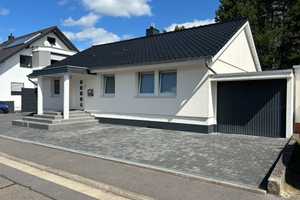 Modernisierter Bungalow mit 5 Zimmern, Süd-Ost-Garten, Kamin und hochwertige Ausstattung 