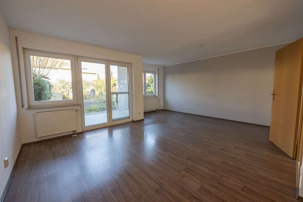 Immobilie in Pegau - Vollunterkellertes Reihenhaus in ruhiger Stadtrandlage mit Garten und separater Garage - Bild 2