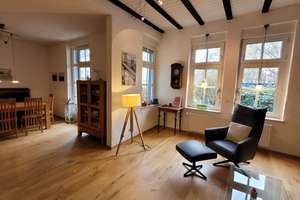 Industrieromantik trifft Altbaucharme: "Haus im Haus" mit Garten