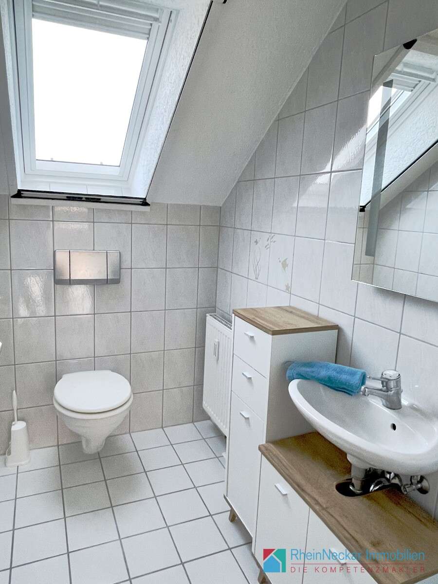 Immobilie in Neulußheim - Moderne und großzügige  Dachgeschosswohnung mit Balkon, beheiztem Hobbyraum, Stellplatz & Garage - Bild 12