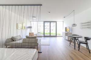 Stilvoll möblierte Souterrain-Wohnung mit sonniger Terrasse - Ihr neues Wohlfühlzuhause!