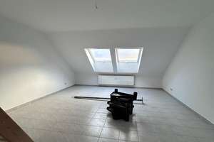 Dachgeschosswohnung mit zusätzlichem großen Hobbyraum
