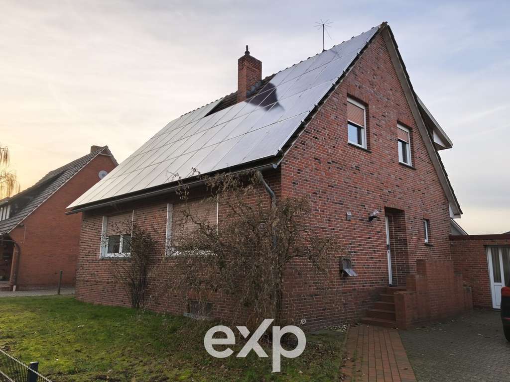 Immobilie in Esterwegen - Attraktive Kapitalanlage: Einfamilienhaus mit Einliegerwohnung und PV-Anlage in Esterwegen - Bild 1