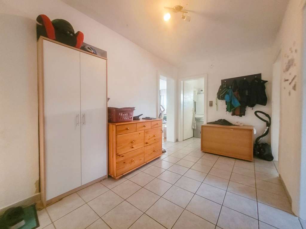 Immobilie in Springe - Vermietete 4-Zimmer-Wohnung mit Potenzial in gepflegten Mehrfamilienhaus - Bild 1