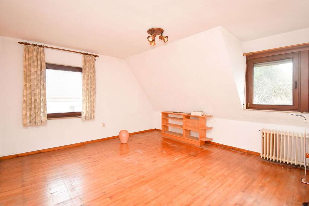 Immobilie in Wallenhorst - Gepflegtes Einfamilienhaus mit Potential auf Erbpachtgrundstück! - Bild 3