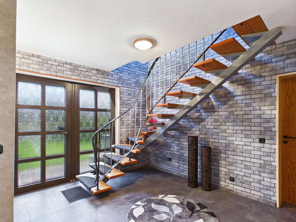 Immobilie in Esens - Familienfreundliches Wohnen in begehrter Lage in Esens -  Einfamilienhaus mit großem Grundstück - Bild 1