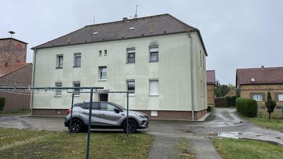 Vermietete Eigentumswohnung mit Gartenanteil und Garage