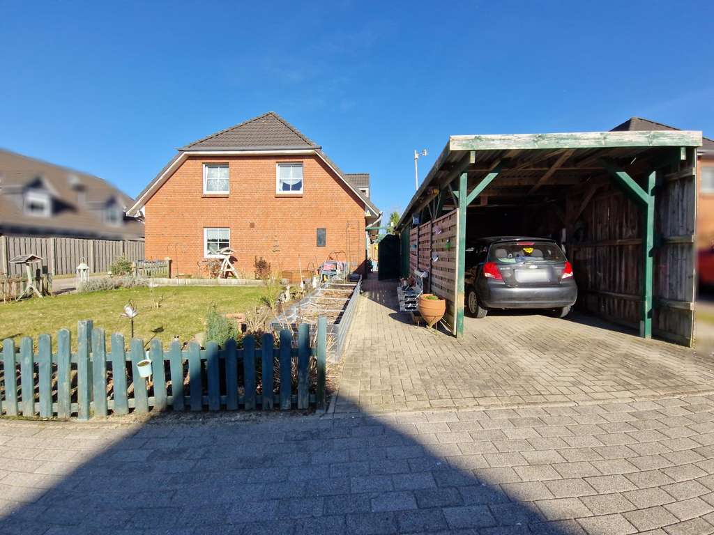 Immobilie in Jagel - Gepflegte sowie vermietete Doppelhaushälfte mit Carport und Terrasse in ruhiger Lage  - Bild 2