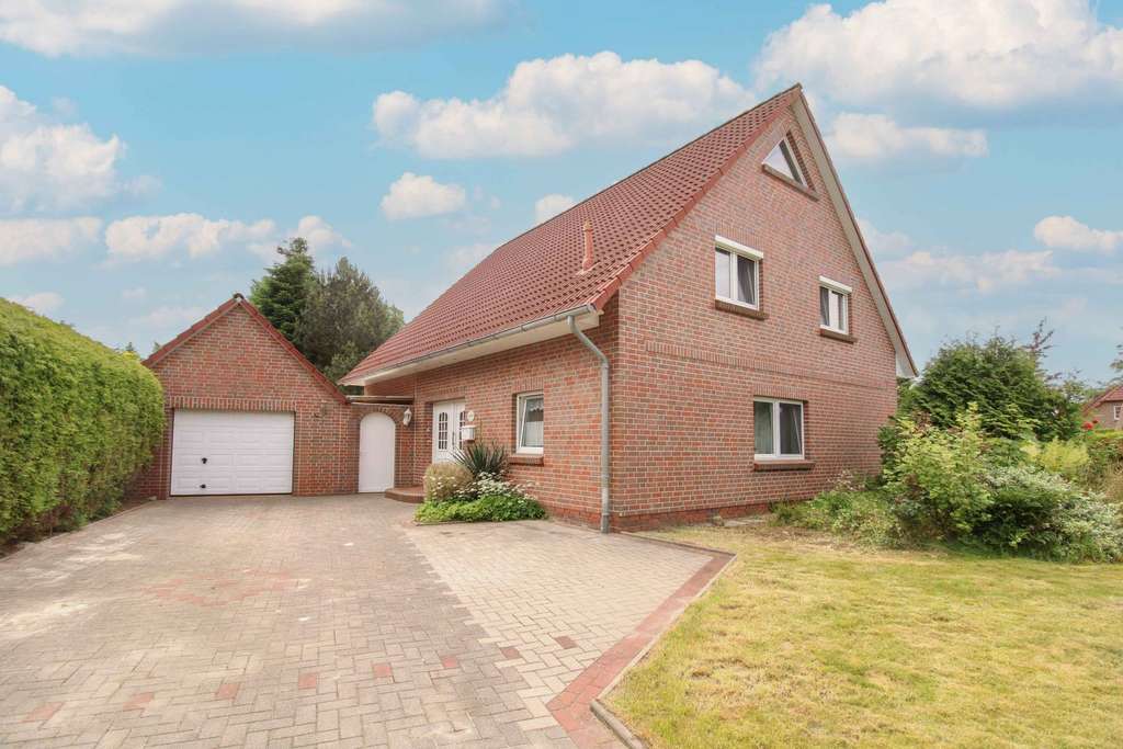 Familienidyll mit Garten, Garage und 3 Freistellplätzen in Norden