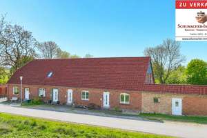 Solides Mehrfamilienhaus mit Kapitalanlage & Reihenhausflair