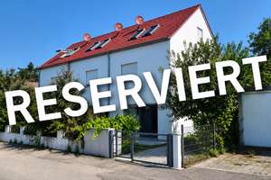 Lebendiger Alltag in Lochhausen: Modernes, durchdachtes Reiheneckhaus