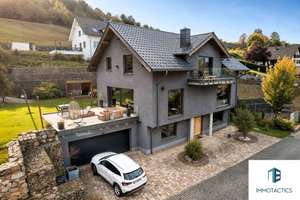 Luxuriöses KfW-55-Einfamilienhaus mit traumhaftem Design, Technik & Rhein-Nähe in Niederheimbach – Die vollständige Adresse der Immobilie erhältst du vom Anbieter., 55413 Niederheimbach – Vorschaubild 1