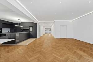 Zeitlose Architektur, exklusives Ambiente: topsanierte Gartenwohnung, 211 m², 3 Bäder, Terrasse