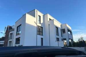 Architektonische Klarheit trifft Wohnkomfort – Erdgeschosswohnung mit Garten & Aufzugsdirektzugang