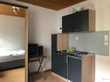 1-Zimmer-Wohnung oder Büroraum mit Küchenzeile