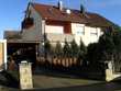 Einfamilien-Doppelhaushälfte mit Carport und Garten
