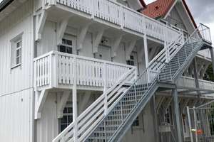 wunderschöne Dachgeschosswohnung mit zwei Balkonen im Holzneubau