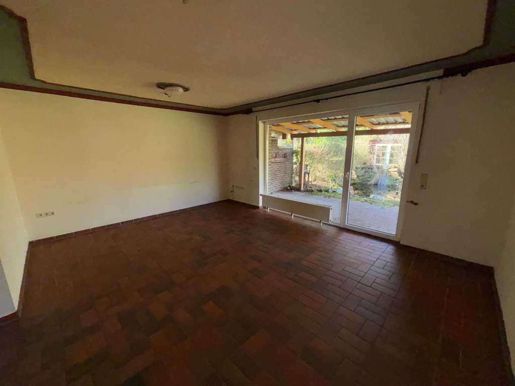 Immobilie in Sonsbeck - Reihenendhaus mit zusätzlichem Platzvorteil, Carport und kleiner Garage in Stadtrandlage von Sonsbe - Bild 3