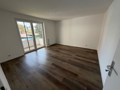 Schöne 3-Zimmer-Wohnung mit Balkon, Einbauküche und Garage in gepflegtem Umfeld