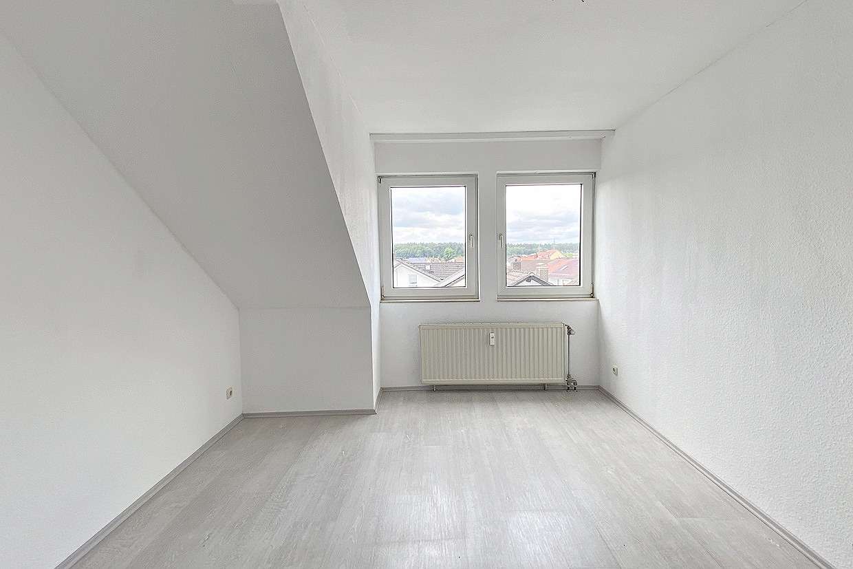 Immobilie in Stockstadt am Main - HELLE DACHGESCHOSSWOHNUNG MIT MODERNEM GRUNDRISS, TG- UND AUßENSTELLPLATZ!
 - Bild 8