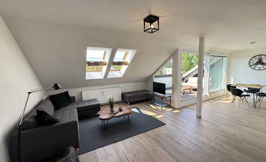 Modernes 2-Zimmer-Dachgeschoss-Apartment mit Dachterrasse & Stil