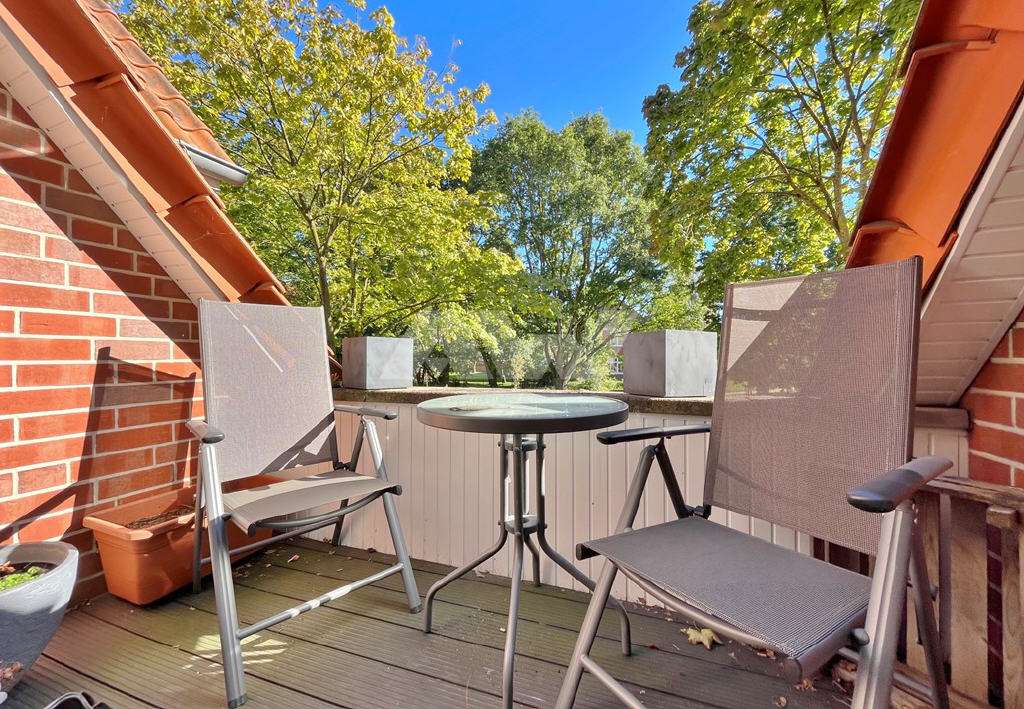 Immobilie in Großheide - Oberwohnung mit Balkon in Großheide, direkt am Marktplatz! - Bild 4