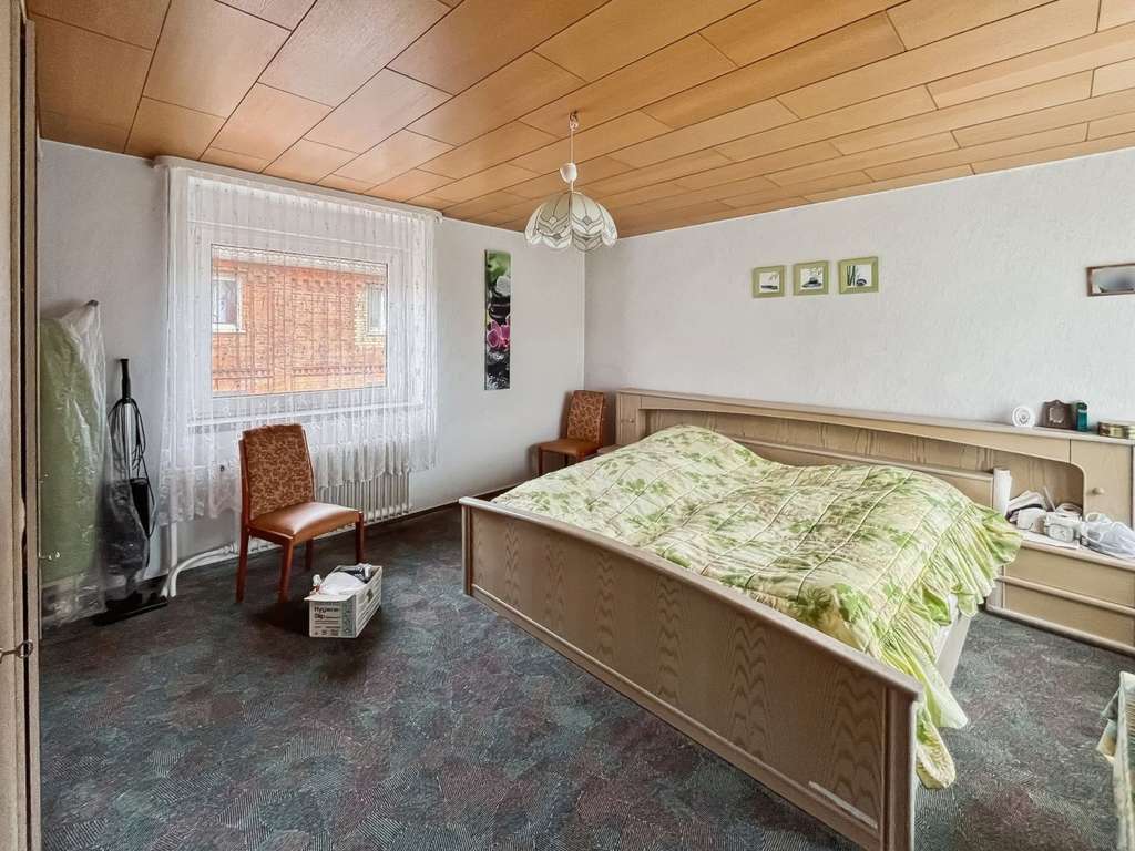 Immobilie in Kabelsketal - Attraktives Zweifamilienhaus mit Potenzial für junge Familien zum Wohlfühlen in Kabelsketal - Bild 4