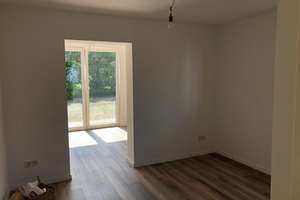 Köln-Holweide, 2,5 Zimmer-Wohnung mit großer  Terrasse, Garten und Garage
