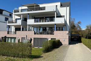 Moderne 3-Zimmer-Gartenwohnung mit großzügiger Terrasse und privatem Gartenanteil in Friedrichshafen