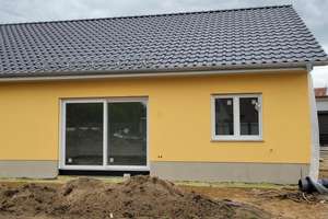 Doppelhaushälfte ebenerdig + Garten und 2 Stellplätze Erstbezug