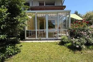DHH mit Wintergarten und schönen Grundstück