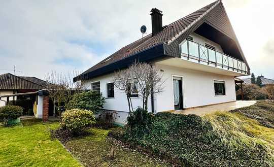 Attraktives Einfamilienhaus in gesuchter und ruhiger Wohnlage mit großem Garten und Garage