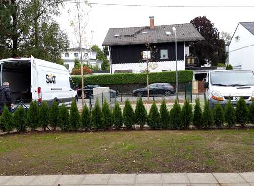 Neubau - Helle freundliche Terrassenwohnung mit Garten und Hobbyraum