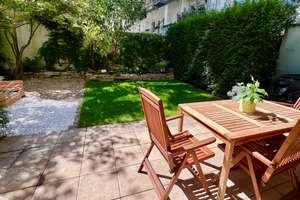 Stylish 3-bedroom FURNISHED garden apartment in a prime location