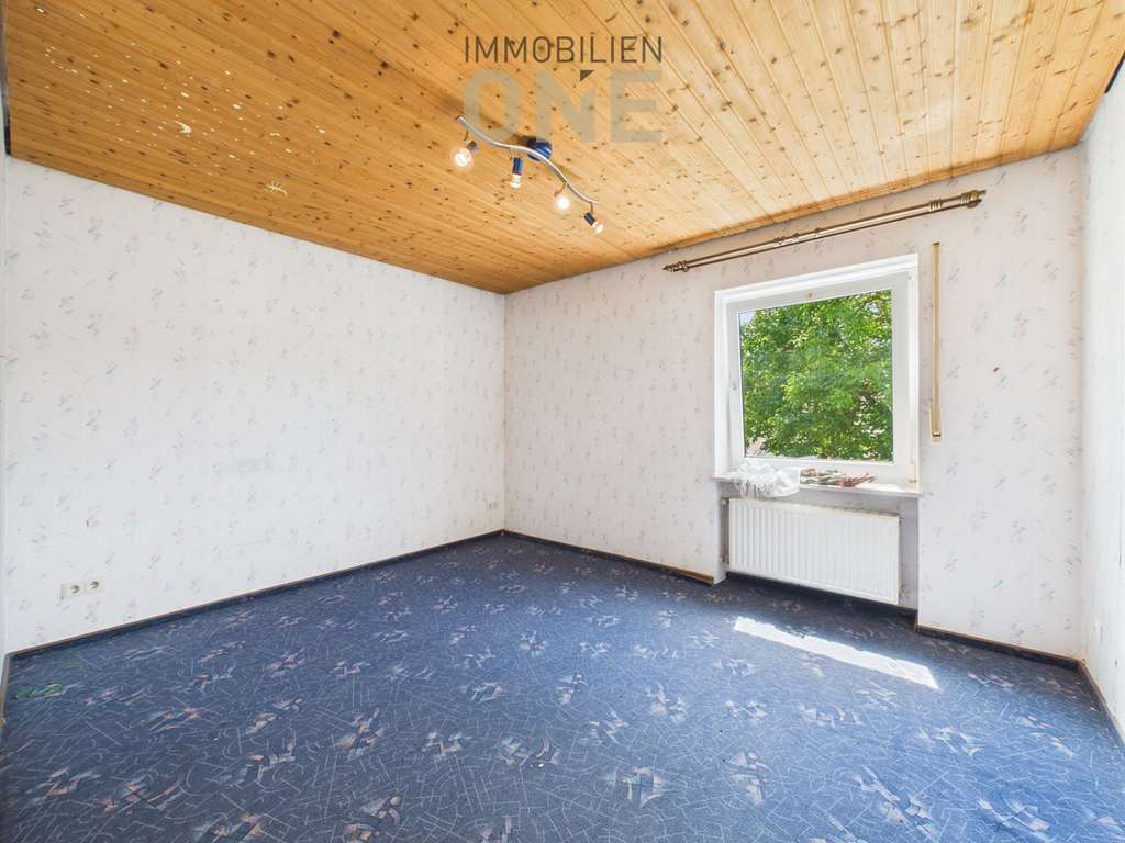 Immobilie in Nittendorf - 4-Zimmerwohnung mit Südbalkon und Einzelgarage - Bild 2
