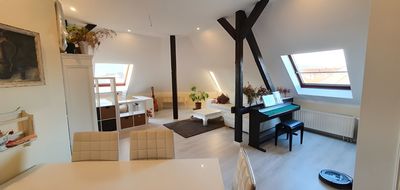 Charmante 3-Zimmer-Dachgeschosswohnung mit Aufzug, EBK und Skyline-Blick in Leipzig
