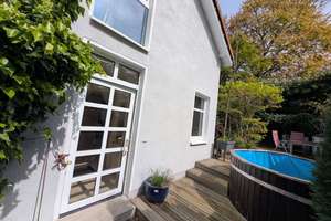 Traumhafte Maisonette mit eigenem Garten, Pool  und Dachterrasse in begehrter Lage von Moitzfeld