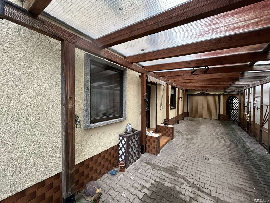 Immobilie in Mutterstadt - Einfamilienhaus mit Anbau, Garage und Garten - modernisierungsbedürftig - Bild 1