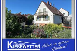 Freistehendes Einfamilienhaus mit Anbau, Nebengebäude und großzügigem Grundstück in ruhiger Wohnlage