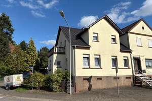 Einfamilienhaus mit Garten und Garage in zentraler Lage von Heusweiler – Die vollständige Adresse der Immobilie erhältst du vom Anbieter., 66265 Heusweiler – Vorschaubild 2