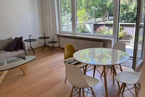 Hochwertig renovierte 2‑Zimmer Wohnung mit großem Balkon im Herzogpark in München-Bogenhausen