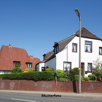 2-Familienhaus mit integrierter Garage und Dachterrassen