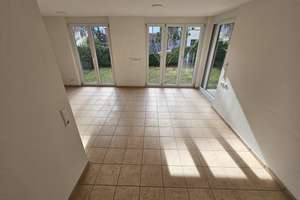 Ruhige Innenstadtlage – Wohnung mit großem Privatgarten & Tiefgarage